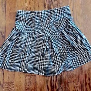 Darling black and white plaid skirt. Brand new no tags. Never worn.